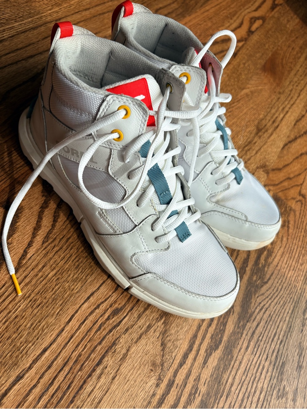 Sorel White High-Top Boots with Red and Teal Accents